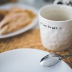 white mug with break word